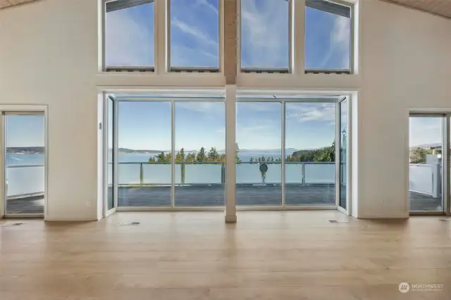 Vaulted ceilings and the windows bring in the natural light and allows you to enjoy the incredible view.