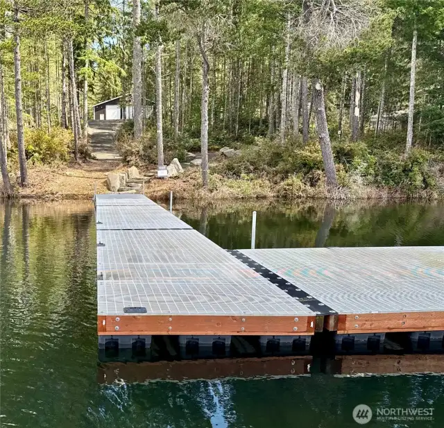 This gorgeous 60'x 28' dock was built in 2022.  The dock platform is 28'x12.5'. It is one of the largest docks in Mason County.
