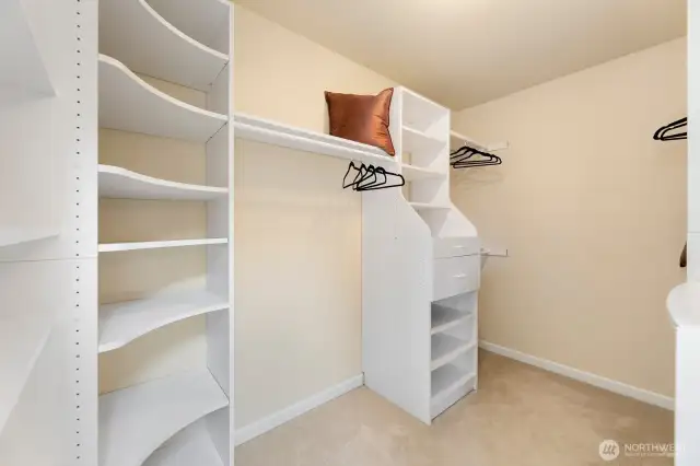 Walk in closet with custom built in organization