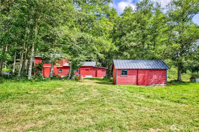 Shop with studio apartment above it, and outbuilding