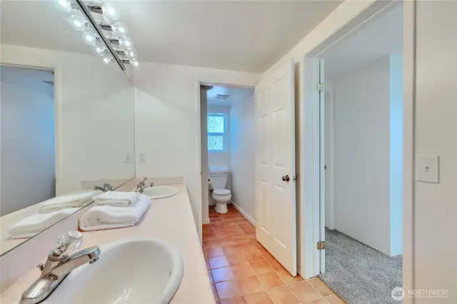 Downstairs bathroom with double sinks
