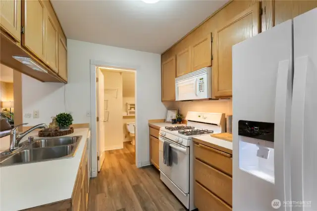 These beautiful new floors really update the space. Plus cooking on a gas stove is the best!