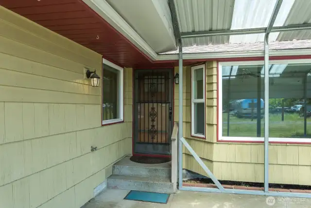 Carport to access home on those rainy days