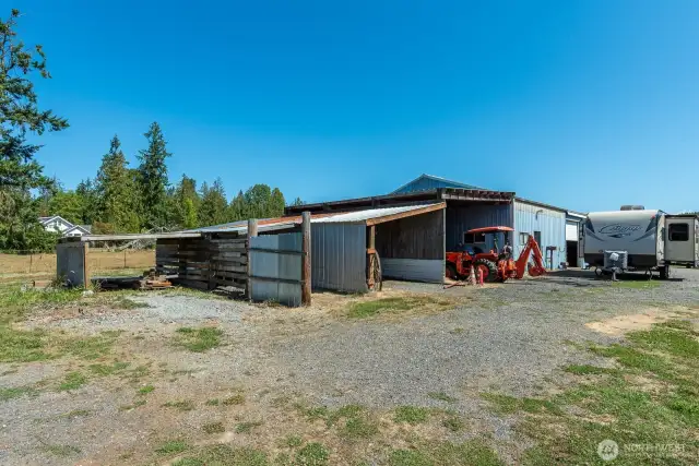 Also attached for more storage is a 11’x15’ carport
