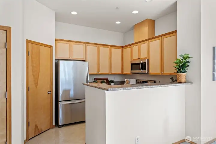 Spacious pantry to the left of the fridge