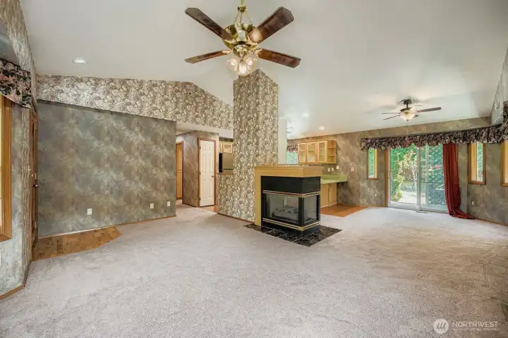 Living room is an open floor plan into the dining area.