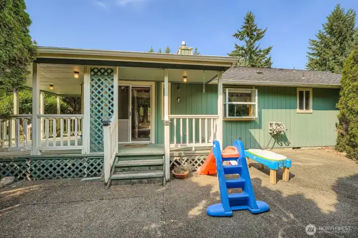 Enjoy the wrap around covered porch all year long and the huge back patio with plenty of room for relaxing and entertaining.