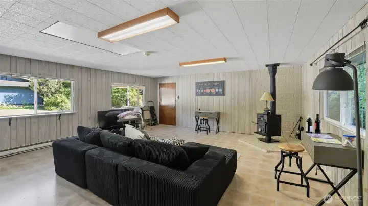 Expansive flex space with endless possibilities—perfect for a media room, play area, or home gym.