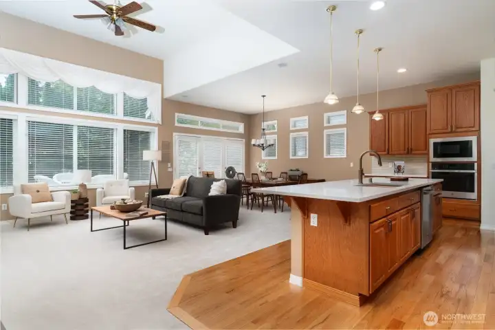 Great room ceiling fan helps circulate air flow.