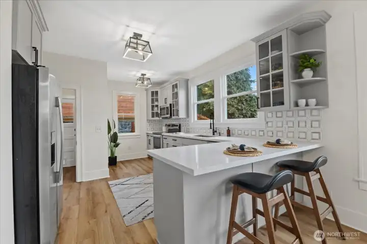 Main Floor Full Kitchen with Countertop Seatting