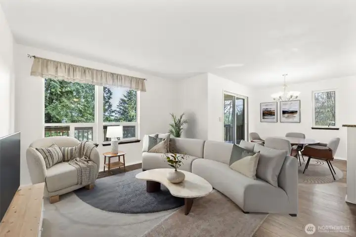 Living Room -Grab a hot beverage, snuggle into your comfy seat and enjoy the privacy and beauty that surrounds you from every window: virtually staged
