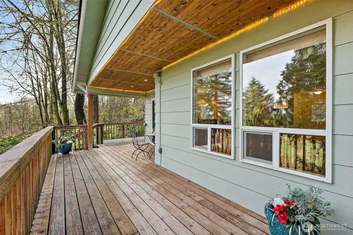 Again, nature awaits, when you step out onto your deck from your Primary bedroom which has access to the back and sides of your home from this amazing wrap around deck,