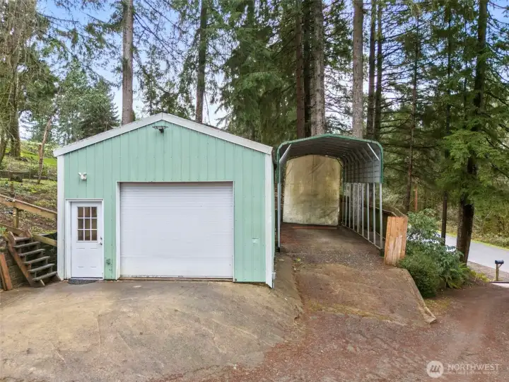 Oh my, does this property also include a large shed with tons of storage and room for a vehicle, as well as covered RV Parking with outlets for your RV? It sure does!