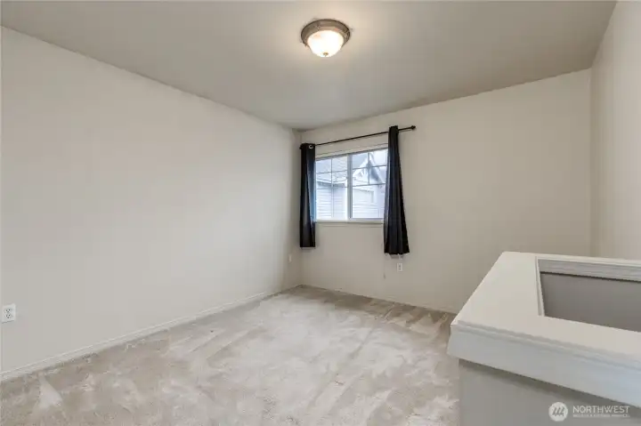 Versatile loft space - perfect for play area, home gym, office, etc.