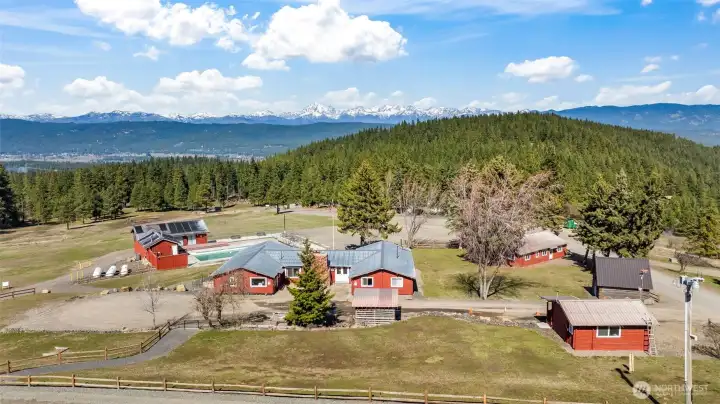 Aerial view of Sky Meadows Ranch community with surrounding mountains and open landscape.
