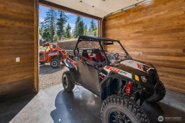 garage with finished interior perfect for storage, toys, or workspace