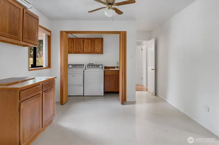 Giant mudroom/utility room with own entrance to home. Connects to other bedrooms. Could convert into kitchenette space for a dedicated ADU.