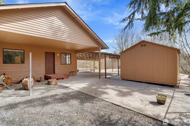 Covered patio and storage shed.