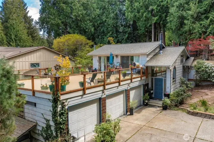 Welcome to 69 North Point Dr! Nestled on a spacious corner lot with views of Lake Whatcom, this property offers ample room to live, relax, and enjoy.