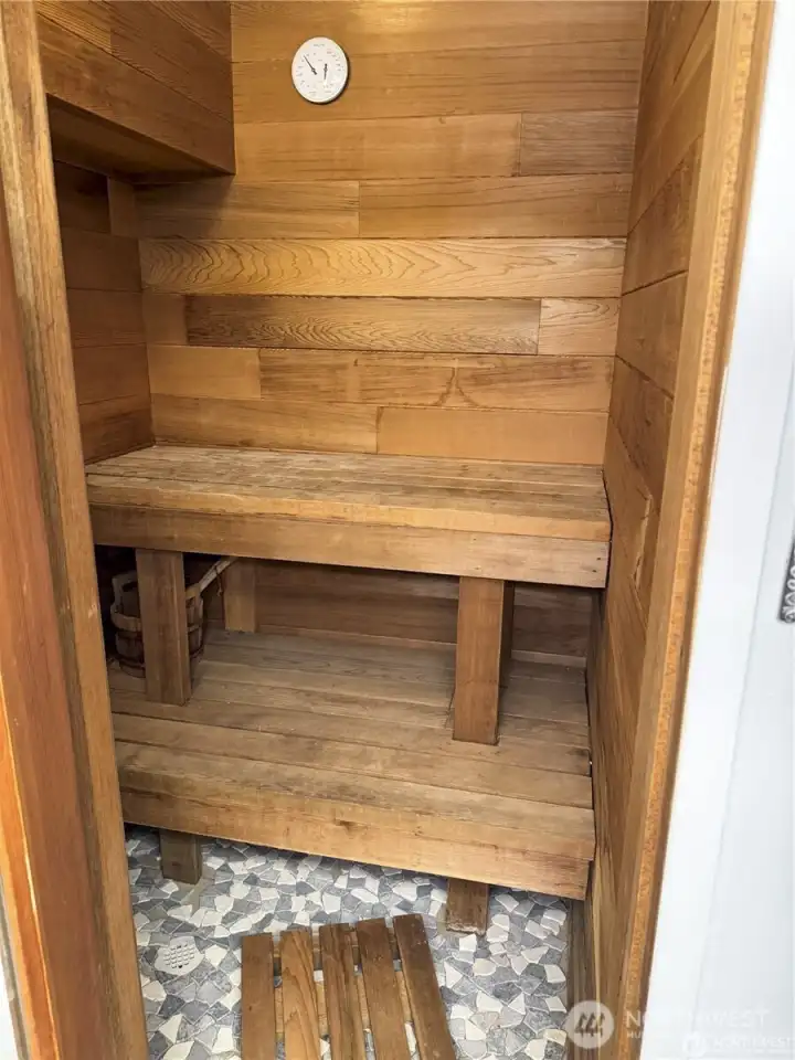 Unwind in your private sauna, thoughtfully incorporated into the updated lower-level bathroom.