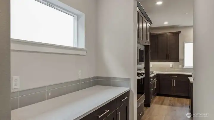 Butler's pantry. Photos are for representation only.  Features, colors and selections may differ from photograph. See site agent for details.