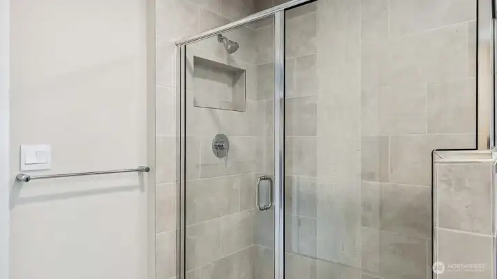 Primary Bathroom Shower. Photos are for representation only.  Features, colors and selections may differ from photograph. See site agent for details.
