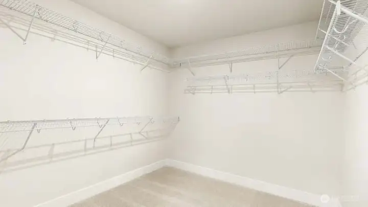 Primary Bedroom Closet. Photos are for representation only.  Features, colors and selections may differ from photograph. See site agent for details.