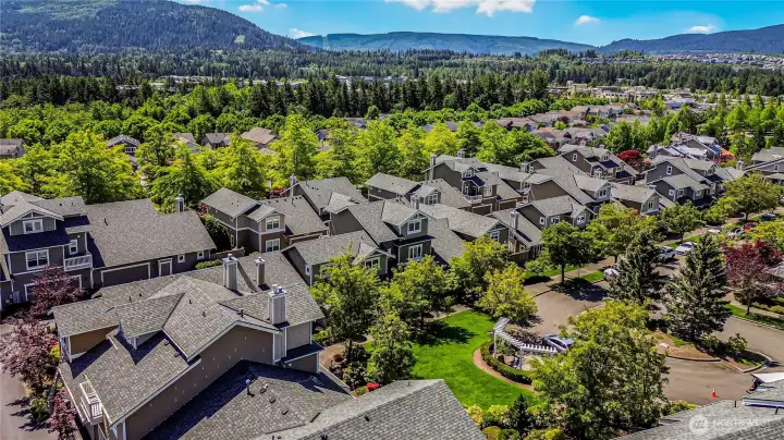 Surrounded by lush landscaping.
