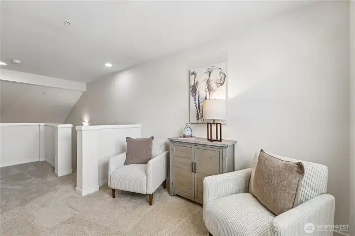 Sitting room or perfect home office upstairs with a walk in closet too!