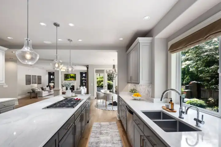 Kitchen features gorgeous greenery views and opens to the spacious breakfast nook and great room. Kitchen features gorgeous greenery views and opens to the spacious breakfast nook and great room.