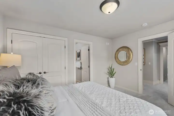 Guest bedroom with full en suite bath for added comfort and privacy. Guest bedroom with full en suite bath for added comfort and privacy.