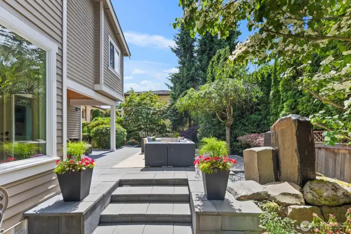 Surrounded by lush landscaping, designed for gathering and outdoor living. Surrounded by lush landscaping, designed for gathering and outdoor living.