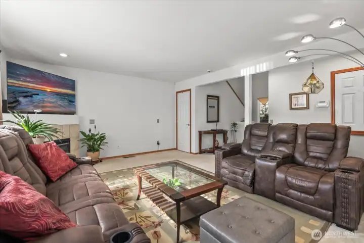Large, open living room with spacious layout and natural lighting.