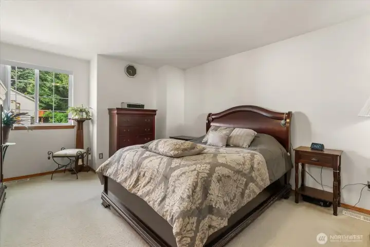 Primary Suite featuring a private ensuite bathroom.