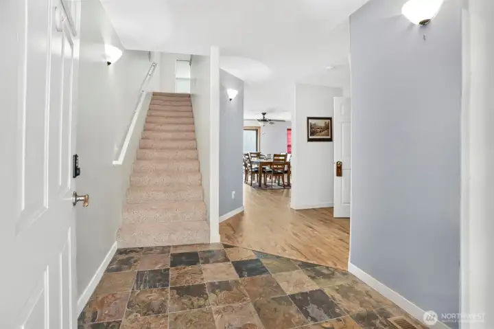 Entry with tile floors and tall celings. Entry with tile floors and tall celings.