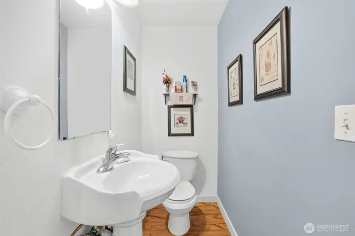 Half guest bathroom on the main floor. Half guest bathroom on the main floor.