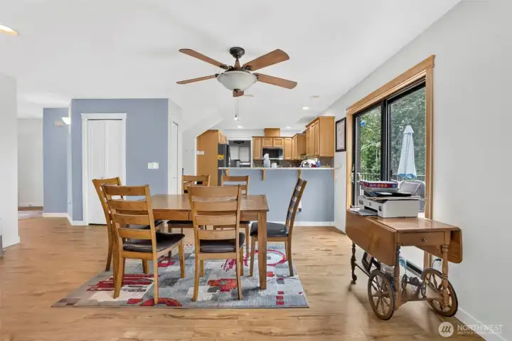 View of the kitchen and dining area from living room. View of the kitchen and dining area from living room.