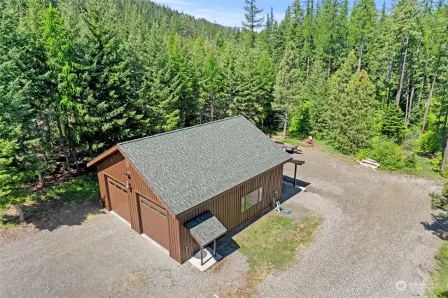 Detached shop with covered carport on back