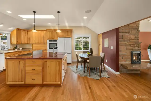 Great Room feeling as the Kitchen flows to the large Family Room~