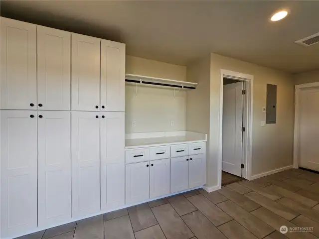 Love all the Storage in this Combo Laundry Room/Pantry!