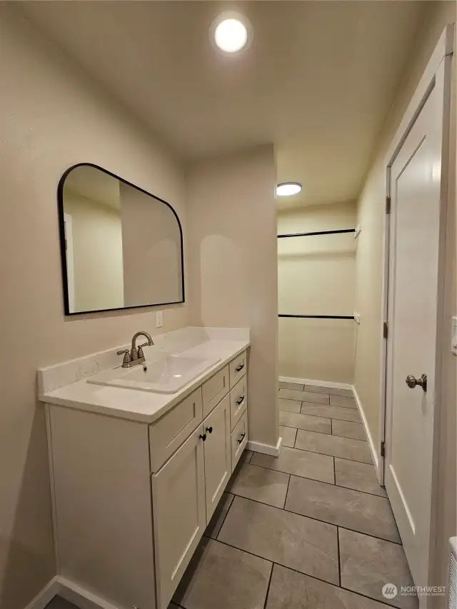 Primary Bath looking back towards walk-in closet