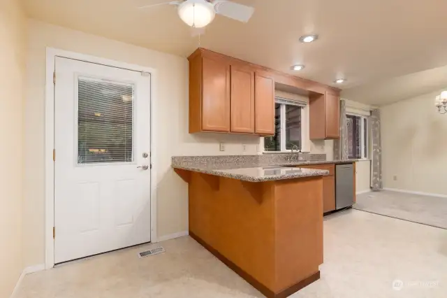 Door off kitchen to back covered deck