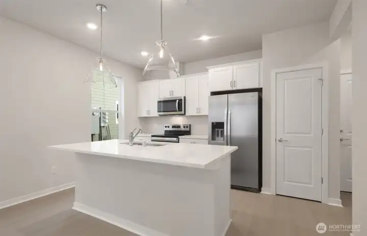 View of kitchen from cafe area