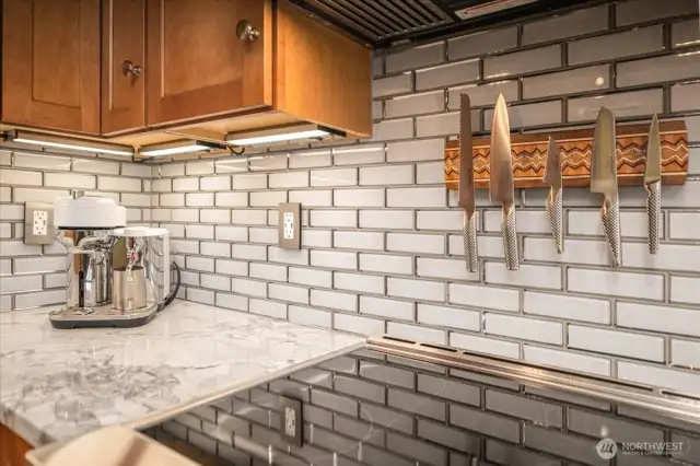 Gorgeous custom tiling through out the whole kitchen
