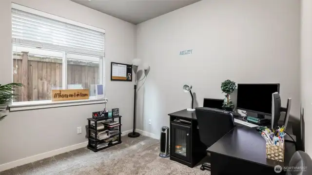 The main level features a dedicated office—ideal for remote work or quiet study.