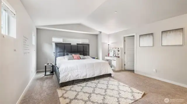 The primary bedroom features a private bath.
