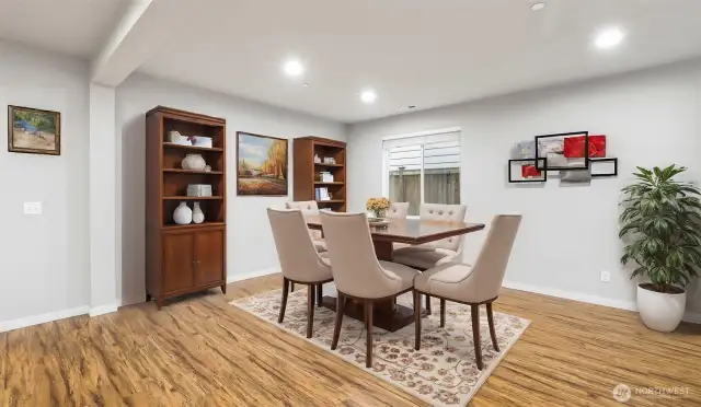 Virtually staged. The dining room can accommodate large or small groups.