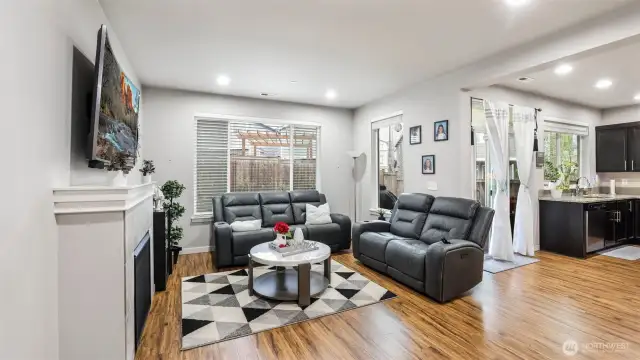 Virtually staged. Gatherings are easy with the living room open to the kitchen and dining room.