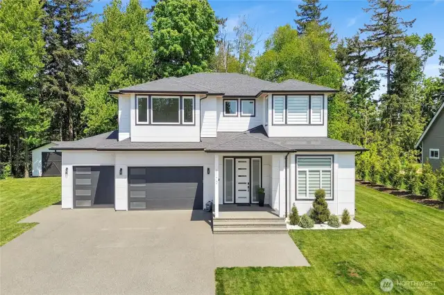 Custom-built home nestled on 1.280 acres