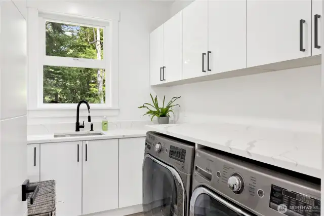 Laundry room with sink  and LOTS of storage space